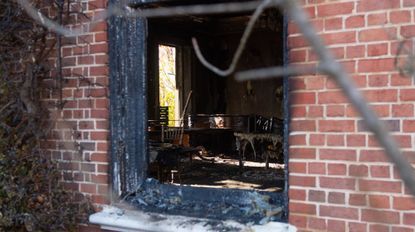 HARRISBURG, PENNSYLVANIA - APRIL 13: Extensive fire damage to the Pennsylvania Governor's Mansion and Gov. Josh Shapiro's residence is seen during a press conference on April 13, 2025 in Harrisburg, Pennsylvania. Authorities have one suspect, Cody Balmer, in custody and say that the suspect accessed the property from a fence in the back. 