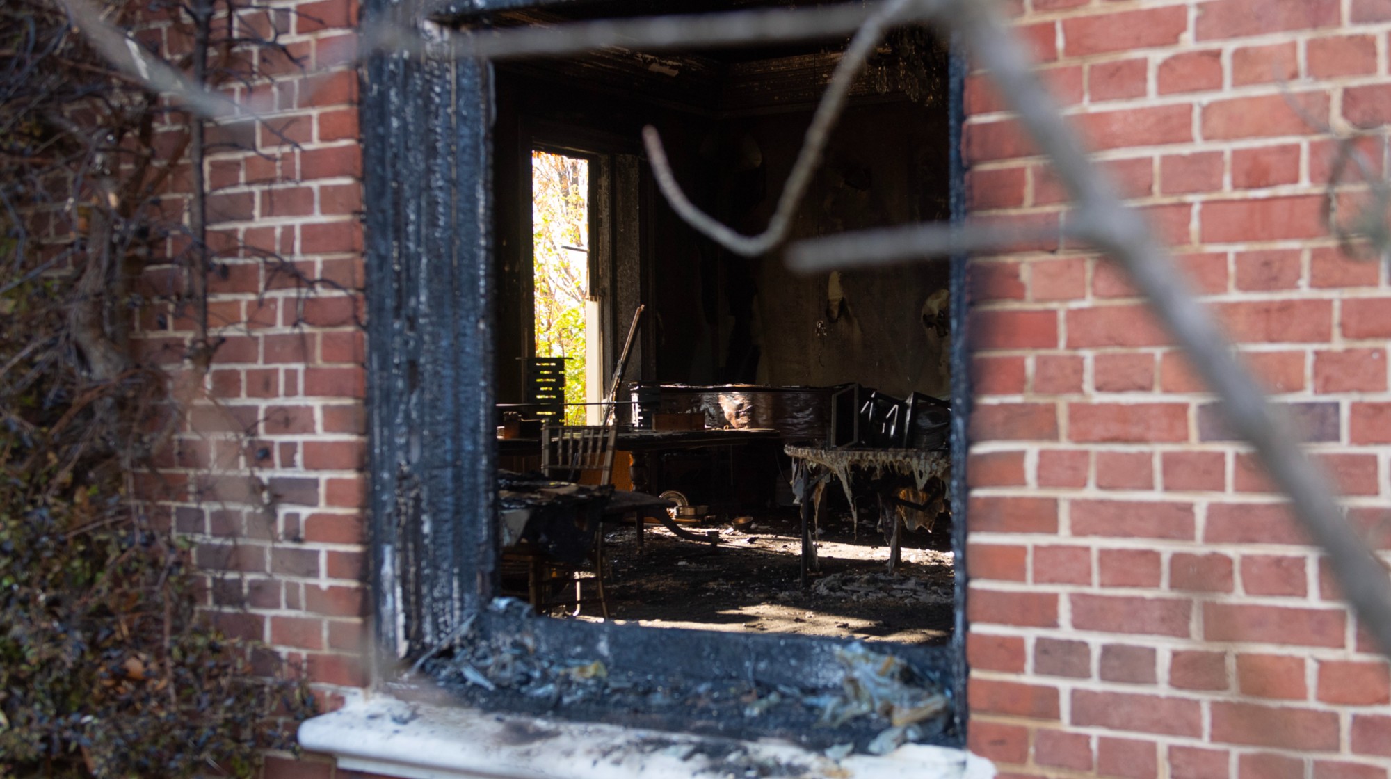 HARRISBURG, PENNSYLVANIA - APRIL 13: Extensive fire damage to the Pennsylvania Governor's Mansion and Gov. Josh Shapiro's residence is seen during a press conference on April 13, 2025 in Harrisburg, Pennsylvania. Authorities have one suspect, Cody Balmer, in custody and say that the suspect accessed the property from a fence in the back. 