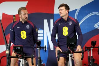 BURTON-UPON-TRENT, ENGLAND - SEPTEMBER 03: Harry Kane and Harry Maguire of England talk in the gym at St Georges Park on September 03, 2024 in Burton-upon-Trent, England. (Photo by Eddie Keogh - The FA/The FA via Getty Images)