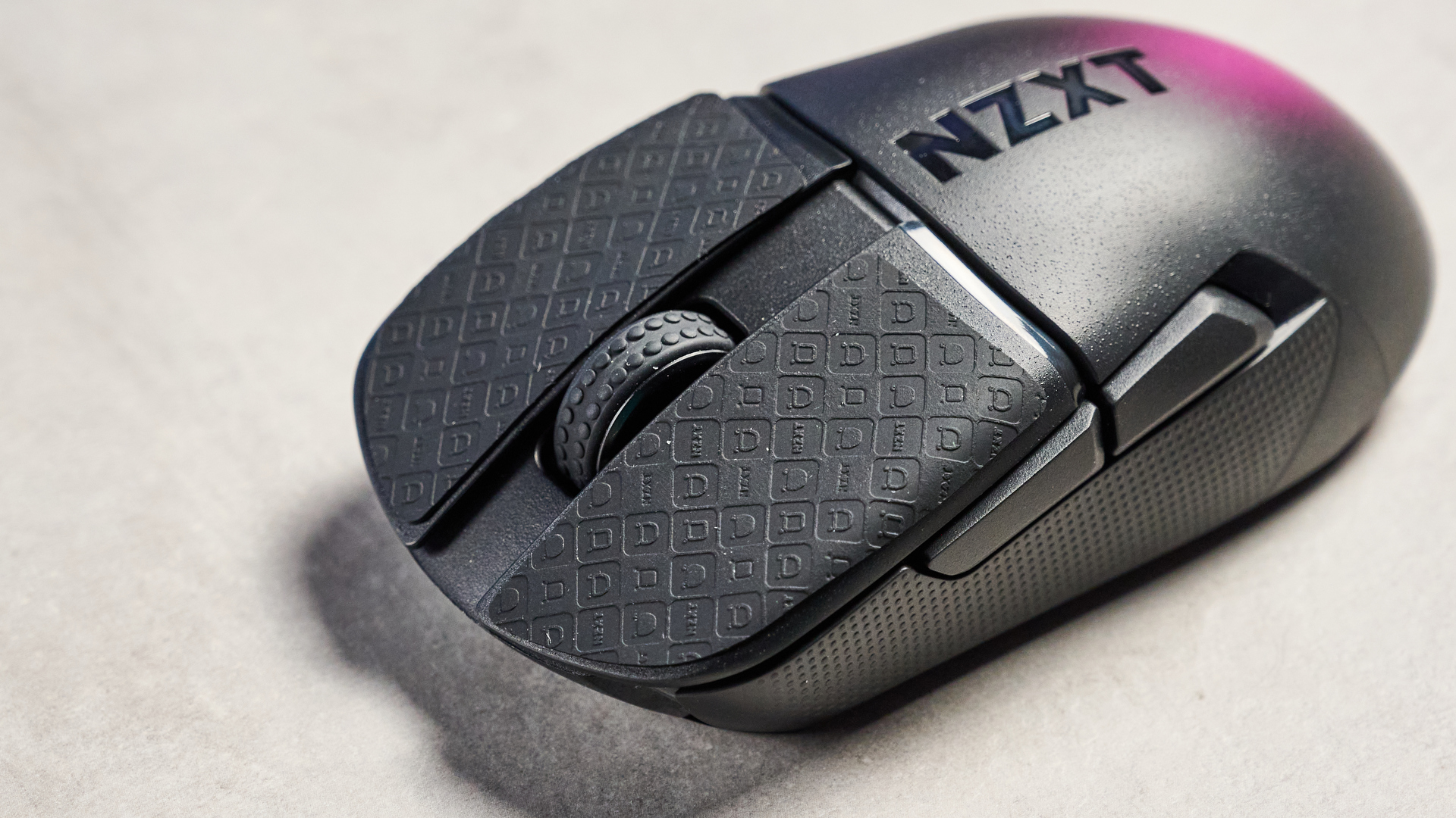 A black NZXT Lift Elite Wireless gaming mouse