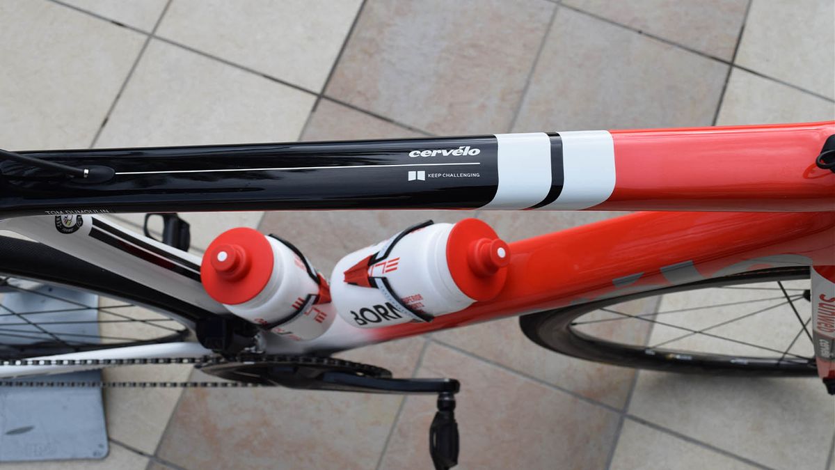 White bands feature across the top tube of the frame