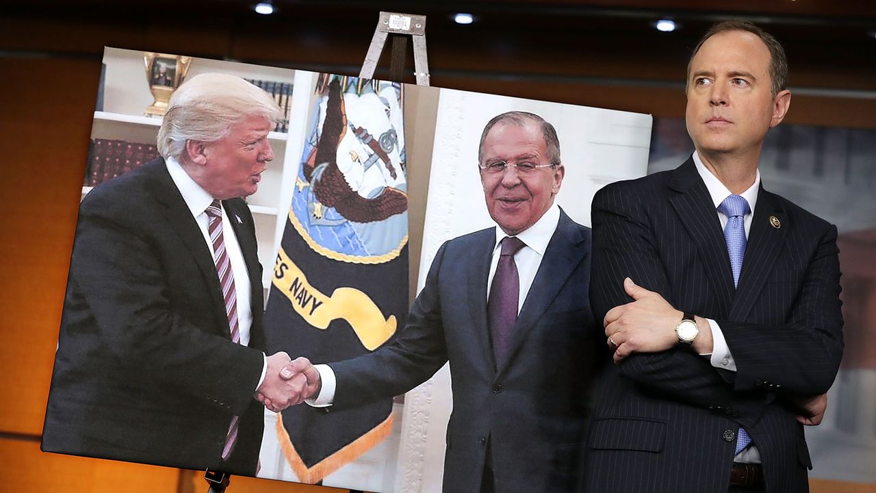 WASHINGTON, DC - MAY 17:House Intelligence Committee ranking member Rep. Adam Schiff (D-CA) stands next to a photograph of President Donald Trump and Russian Foreign Minister Sergey Lavrov du