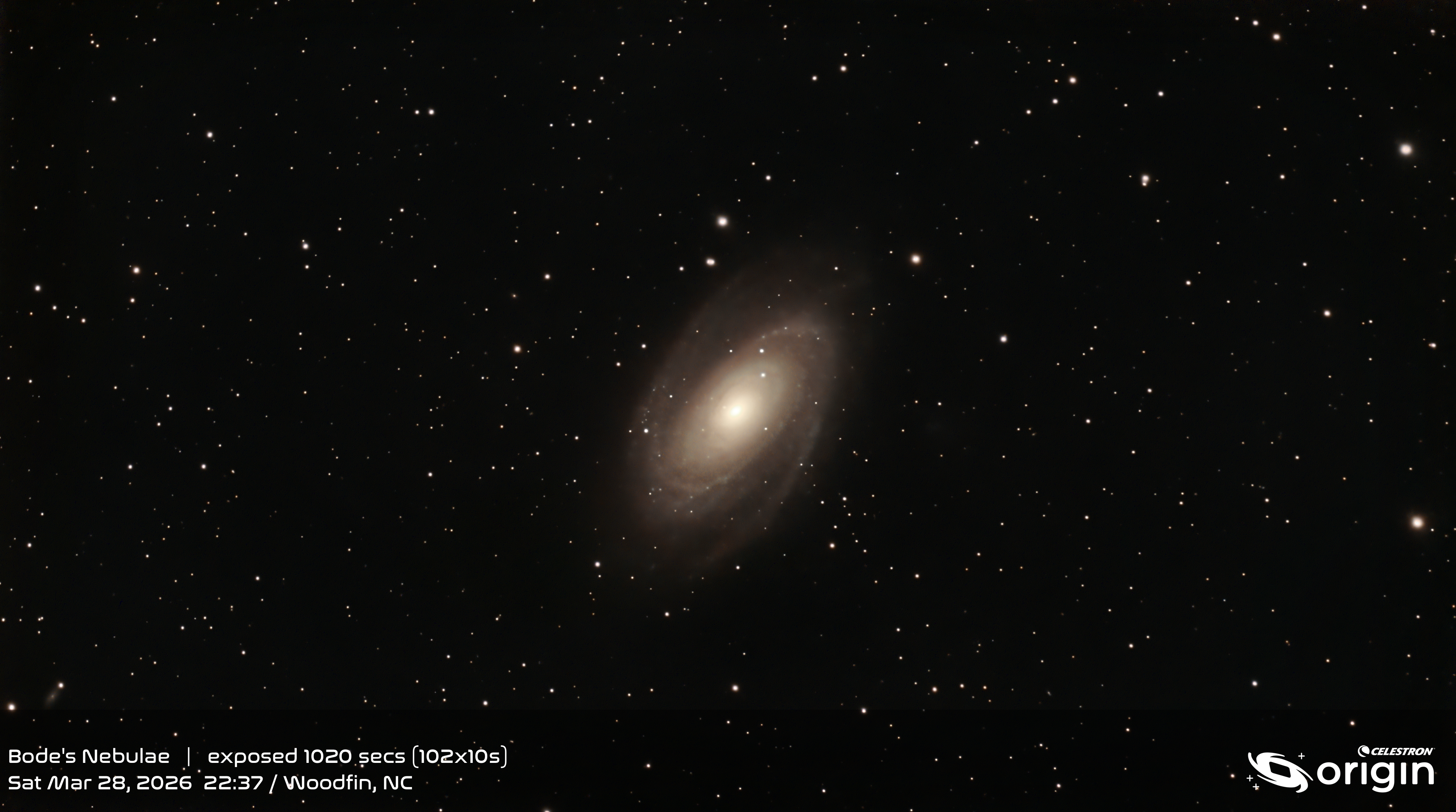 A photo of a galaxy hanging in deep space.
