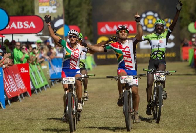 Cherise Stander and Duane Stander celebrate an emotional finish in memory of Burry