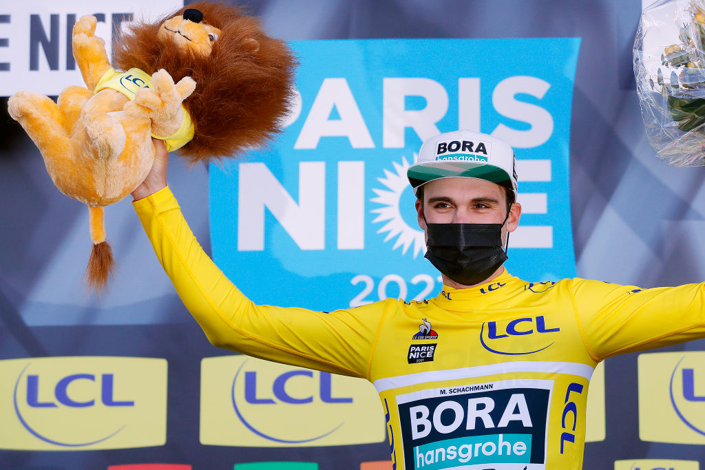 LEVENS FRANCE MARCH 14 Podium Maximilian Schachmann of Germany and Team Bora Hansgrohe Yellow Leader Jersey Celebration during the 79th Paris Nice 2021 Stage 8 a 927km stage from Le PlanduVar to Levens 518m Lion Mascot Mask COVID safety measures Stage itinerary redesigned due to COVID19 lockdown imposed in the city of Nice ParisNice on March 14 2021 in Levens France Photo by Bas CzerwinskiGetty Images