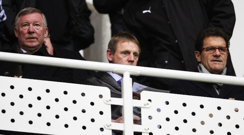 Sir Alex Ferguson watches an FA Cup tie between Reading and Tottenham in 2008, alongside Stuart Pearce and Fabio Capello.