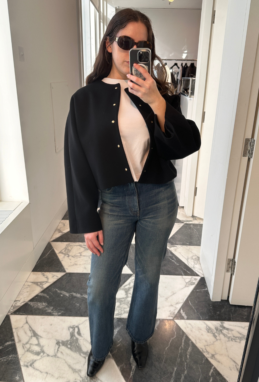 An image of Who What Wear UK SEO Writer, Ava Gilchrist, wearing Celine bootcut jeans.