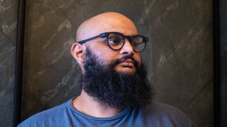 Harish wearing MemoMind One camera-free smart glasses