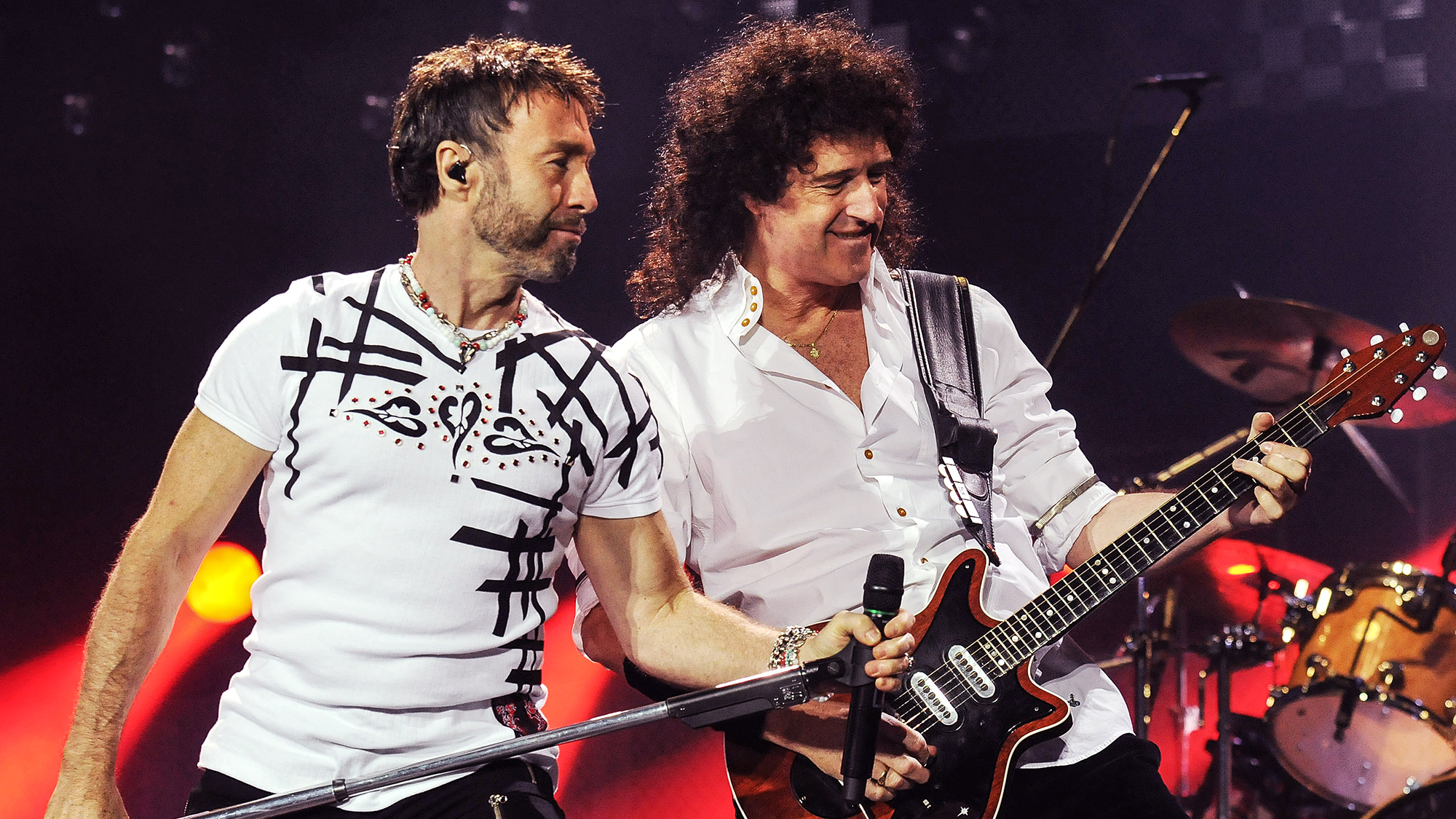 Paul Rodgers (L) and Brian May of Queen perform at the O2 Arena on October 13, 2008 in London, England.