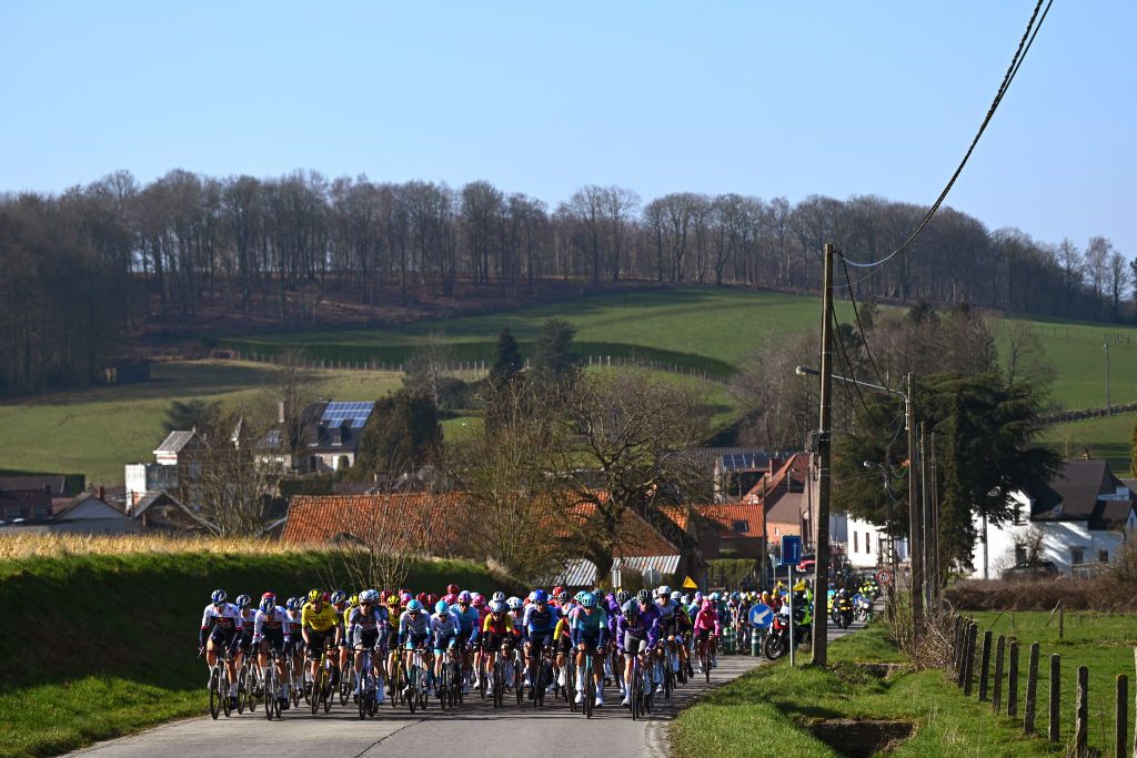 The peloton rolls through Flanders