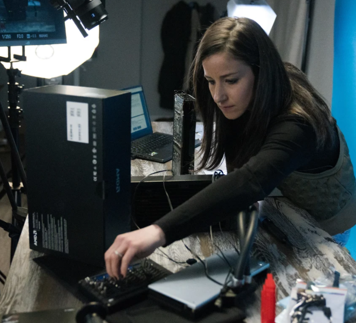 Brunette woman building a custom PC