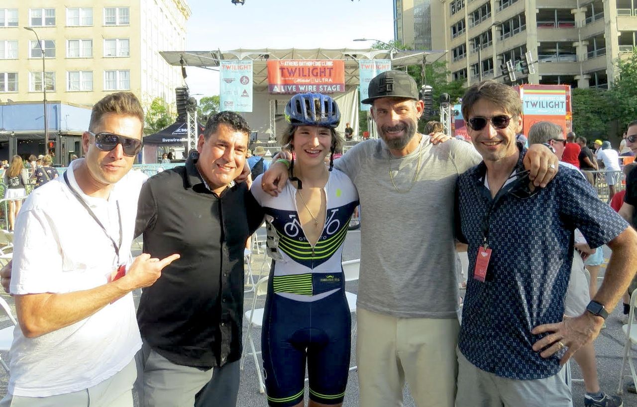 Enzo Hincapie (center) is congratulated by his fan club in Athens, Georiga (IL to R): Christian Vande Velde, Rich HIncapie, father George Hincapie and Bobby Julich