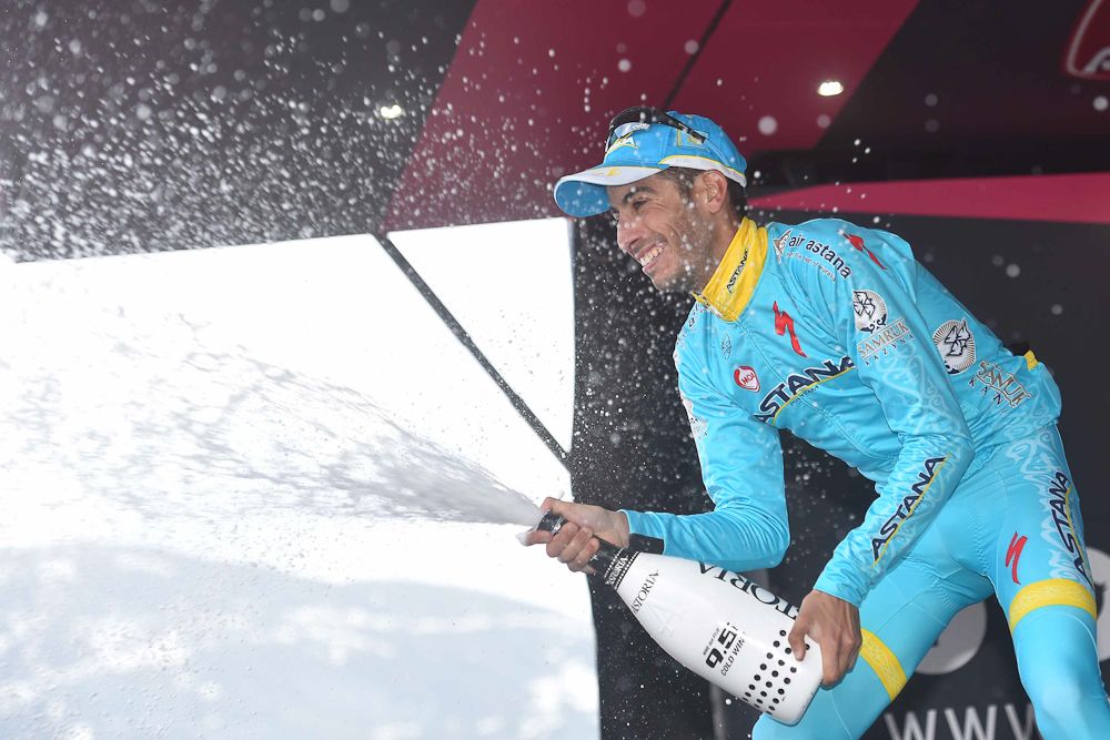 Fabio Aru (Astana) is getting pretty good at the prosecco spraying now