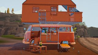 Outbound - A van parked on the beach. It's all setup for camping over night and has a tiny house built on top of it. 