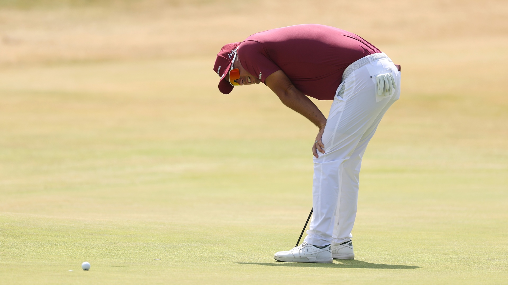 Lucas Herbert reacts to a missed putt on the 18th green at The Open 2026