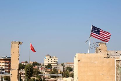 An American flag flies in Syria