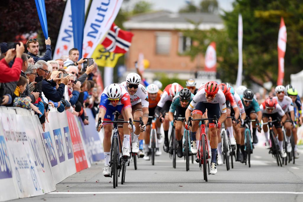 ISBERGUES FRANCE SEPTEMBER 18 LR Arnaud Demare of France and Team Groupama FDJ Marc Sarreau of France and Ag2R Citroen Team and Edward Theuns of Belgium and Team Trek Segafredo sprint to win during the 76th Grand Prix dIsbergues Pas de Calais 2022 a 1976km one day race from Isbergues to Isbergues GPIsbergues on September 18 2022 in Isbergues France Photo by Luc ClaessenGetty Images
