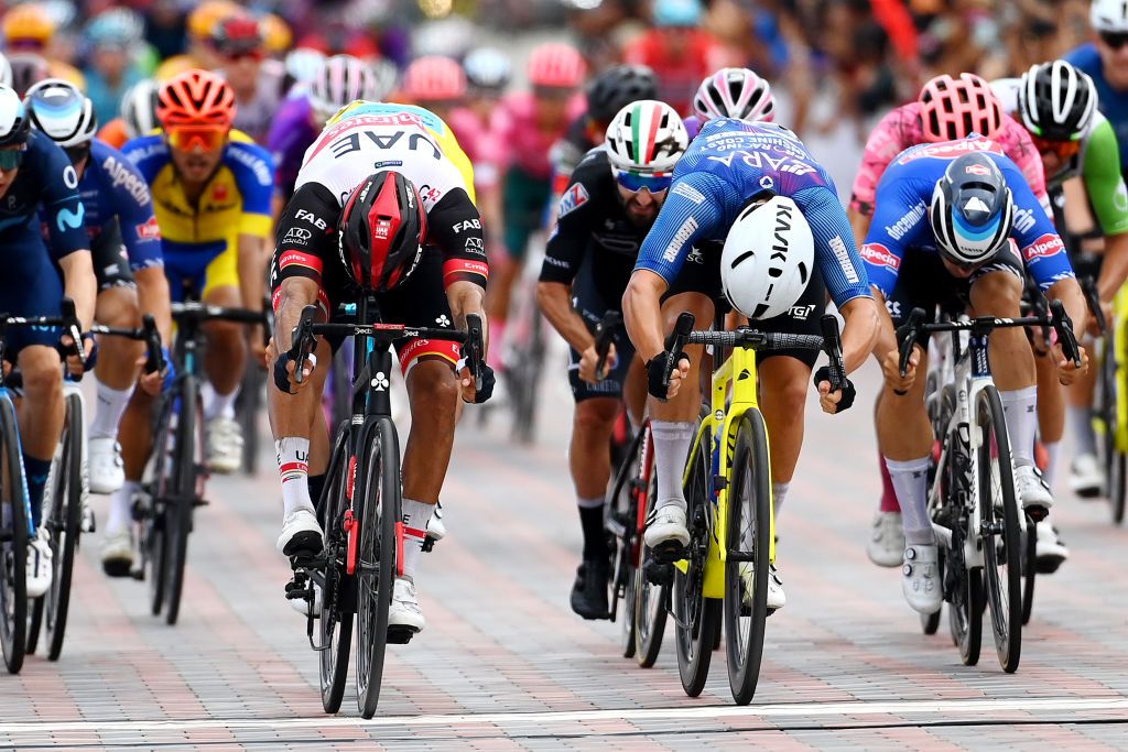 Juan Sebastian Molano won it with a bike throw