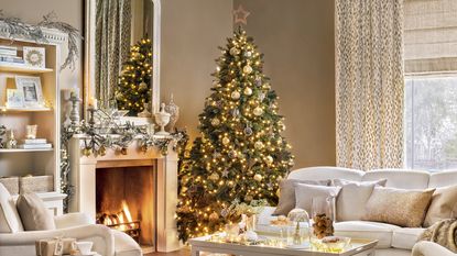 A beautifully decorated tree in a white an dbeige living room