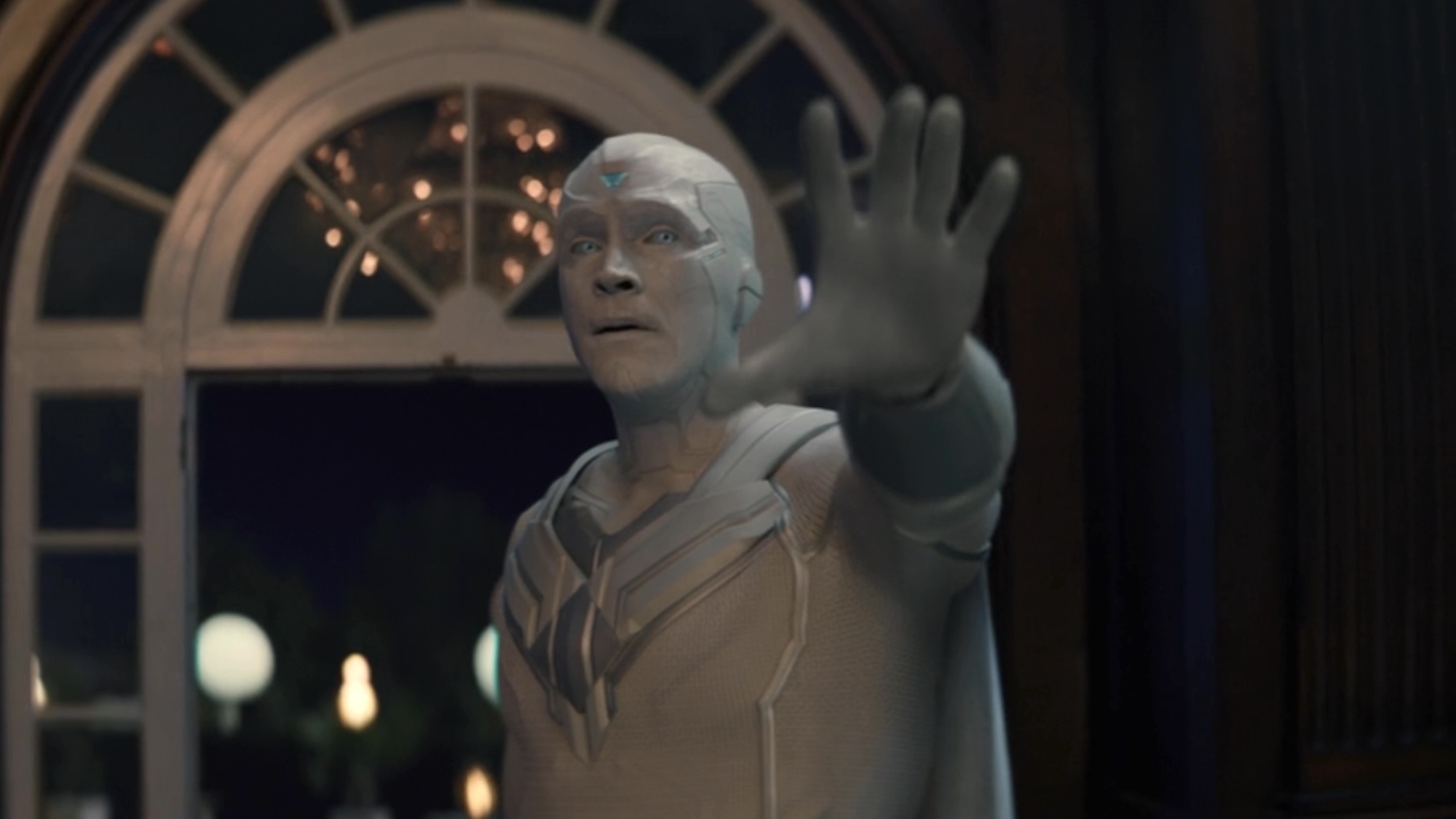 White Vision with his arms outstretched in Episode 4 of VisionQuest.