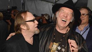 Stephen Stills laughing with Neil Young in 2011