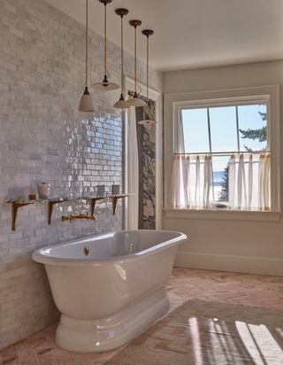 A bathroom with Moroccan zellige tiles on the walls