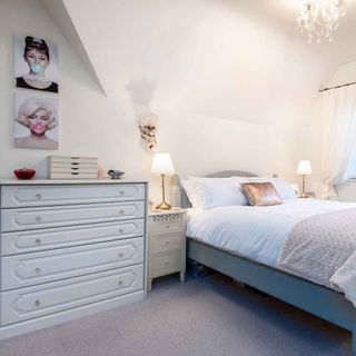bedroom with attic room and white wall