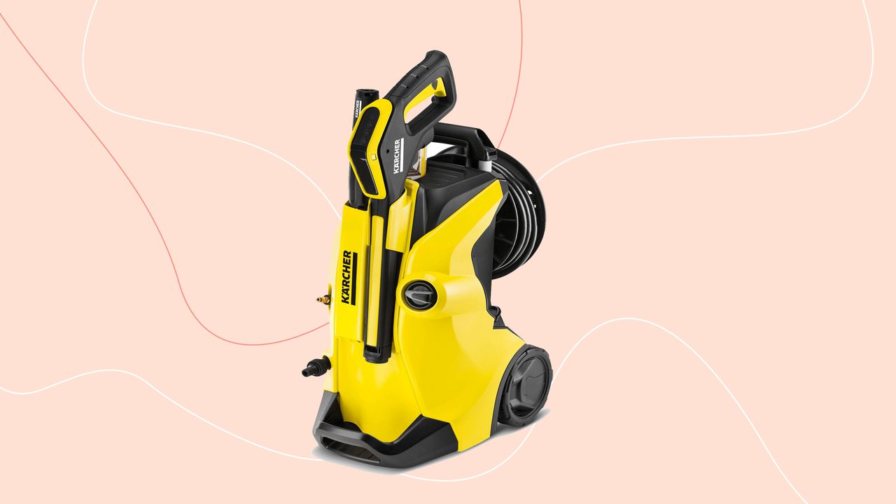 Yellow Karcher pressure washer on Ideal Home style background, which is pink