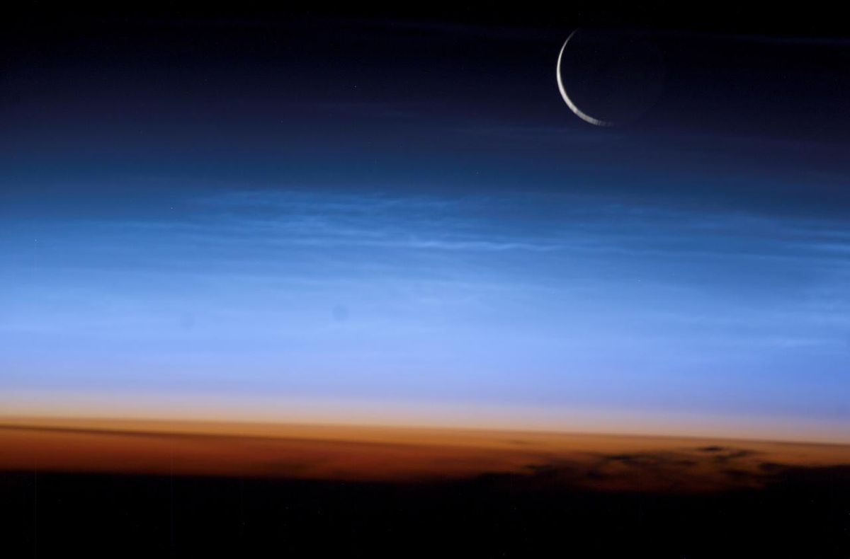 This photo of Earth and the moon was taken by an astronaut at the International Space Station in 2003.