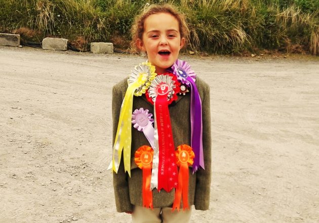 Ellie showing off her rosettes
