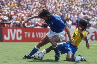 Italy's Paolo Maldini attempts to hold off Brazil's Aldair in the 1994 World Cup final.
