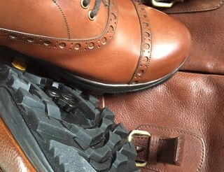 Brogue shoe and boot have a sole which accepts SPD cleats
