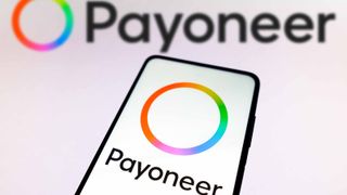 Payoneer logo on smartphone and in background