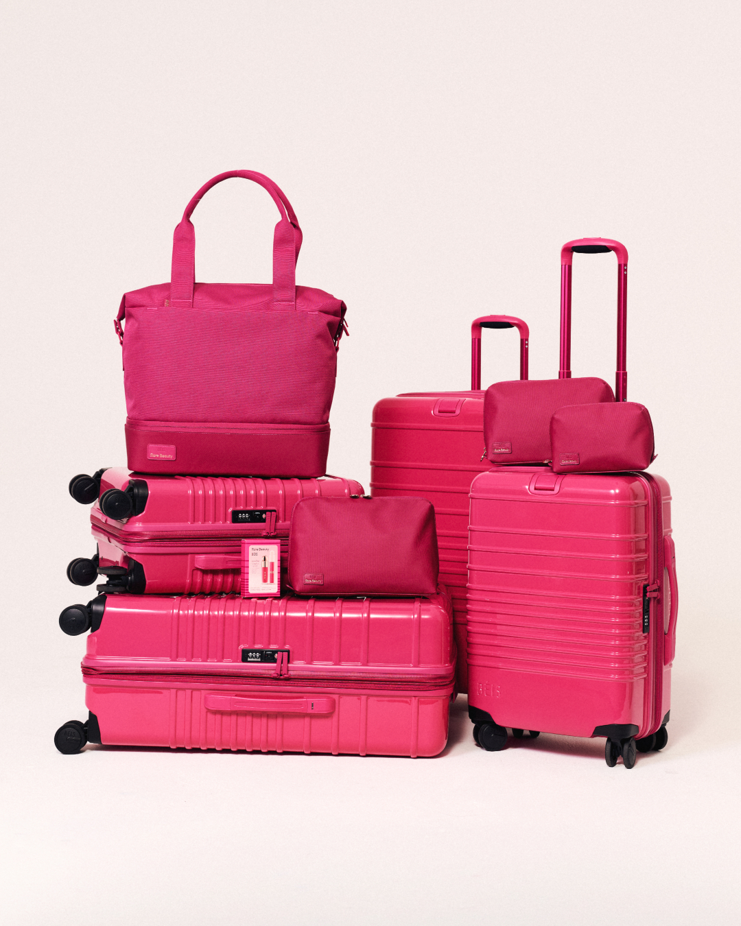 B&amp;Eacute;IS / Rare Beauty hot pink suitcases