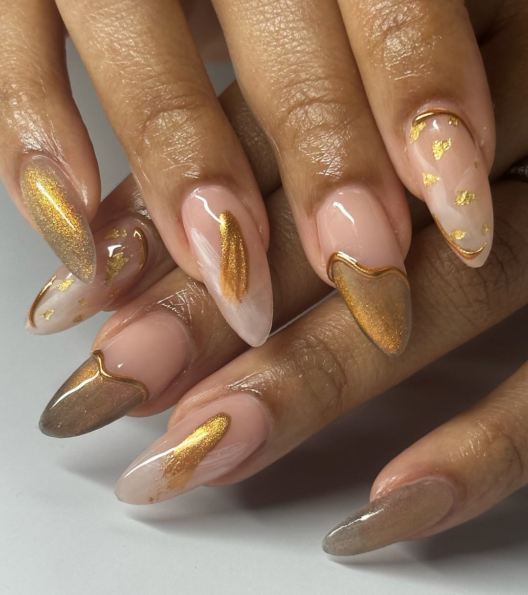 gold cat eye manicure