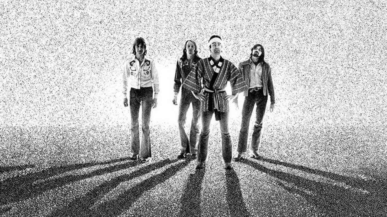 Bad Company as they appear on the cover of Burnin' Sky