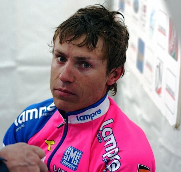 Cunego was happy with his win but the smile was hard to produce after a cold, wet stage.