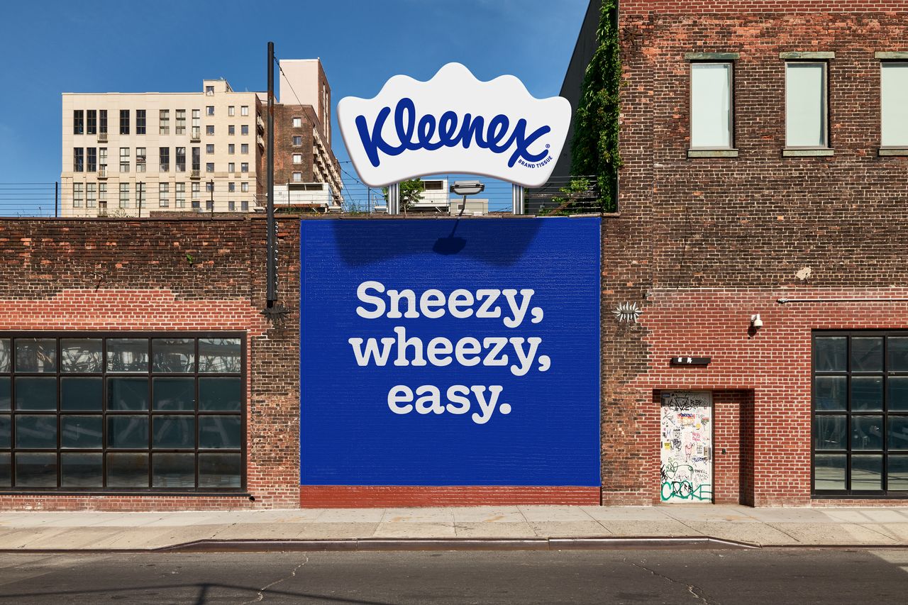 Kleenex new brand billboard ad that says 'sneezy, wheezy, easy'