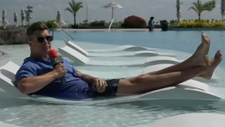 Colin Jost with injured foot in the pool talks Olympics 2024.