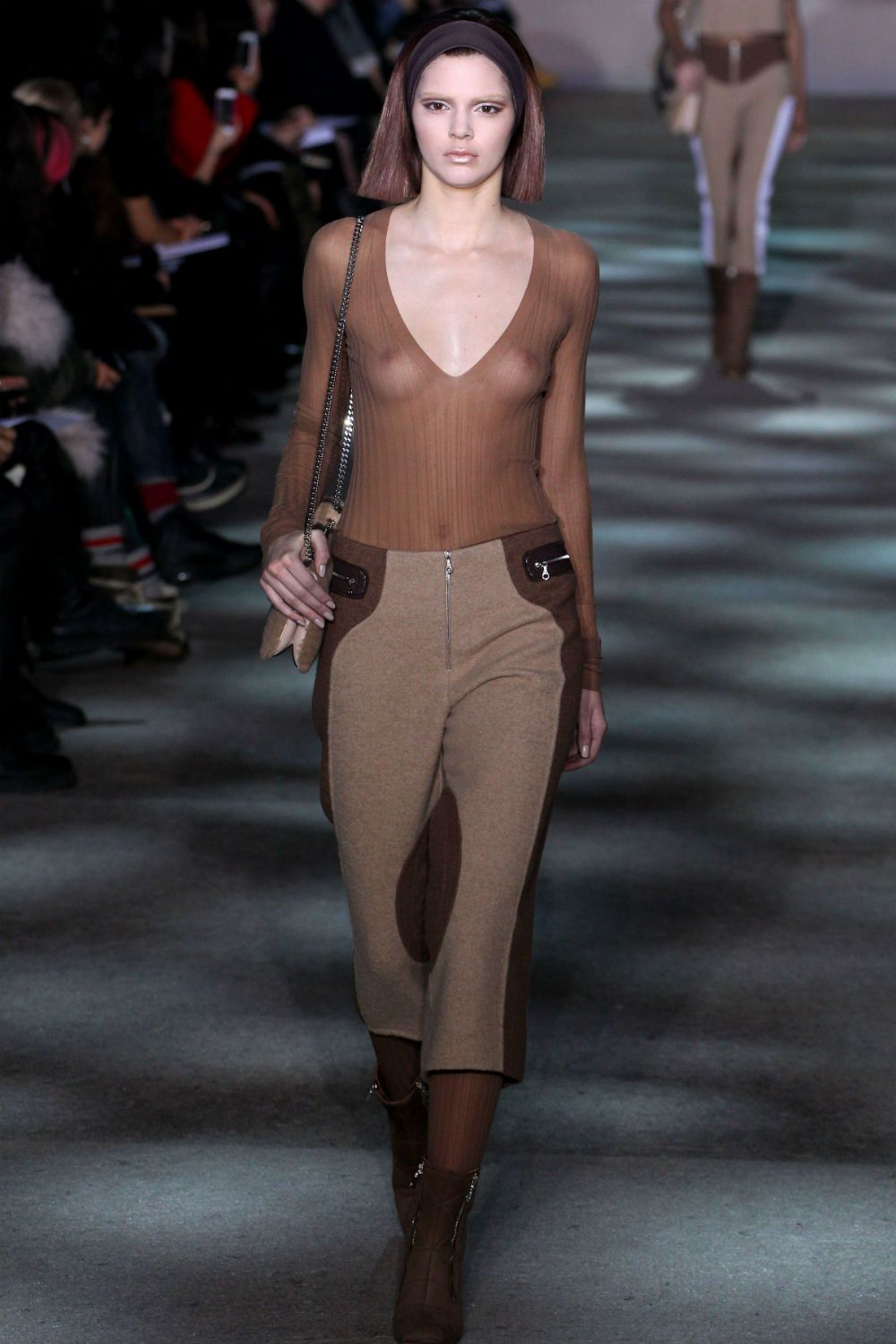 Kendall Jenner models for Marc Jacobs in a sheer top.