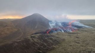 A picture of the new fissure spewing lava and volcanic gasses.