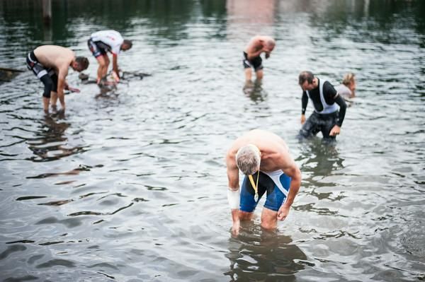 Racers clean up after the final stage of the TransAlp