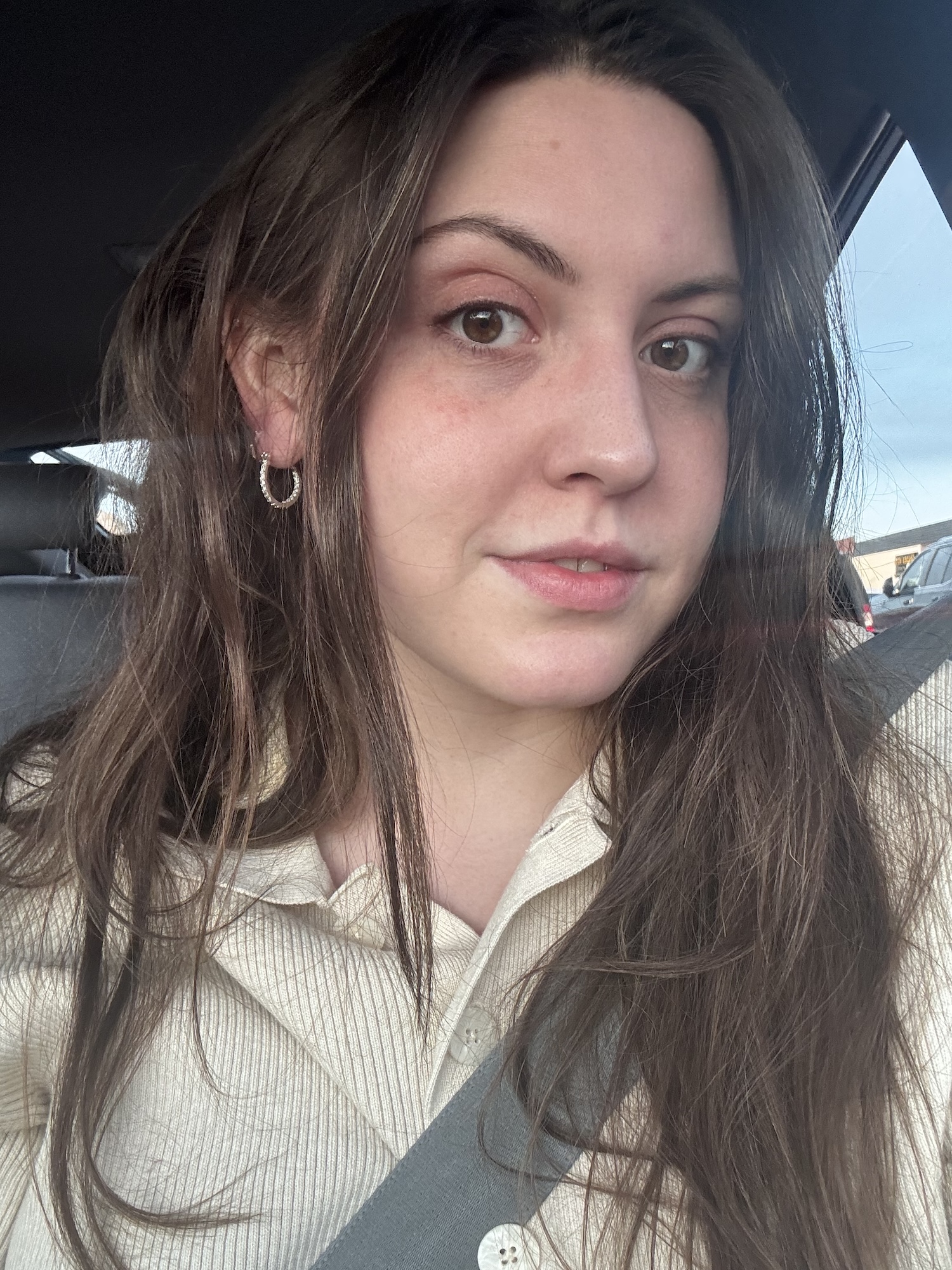 Sophia Vilensky showing off her healthy hair after using Olaplex's leave-in conditioner.