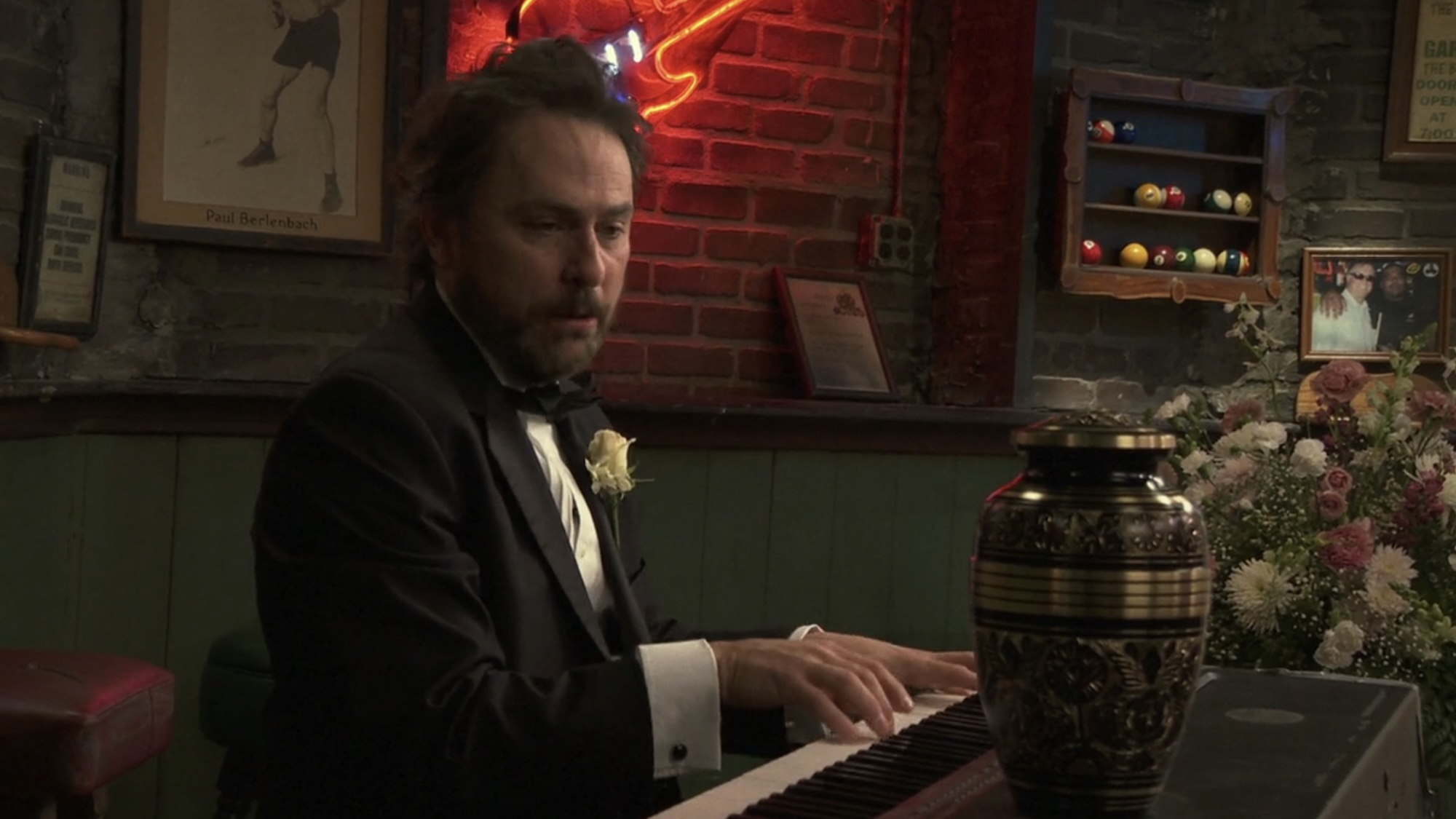 Charlie playing keyboard with his mom's urn on it in It's Always Sunny in Philadelphia Season 18