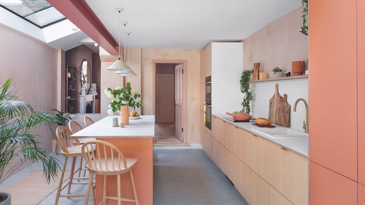 Plywood and orange kitchen