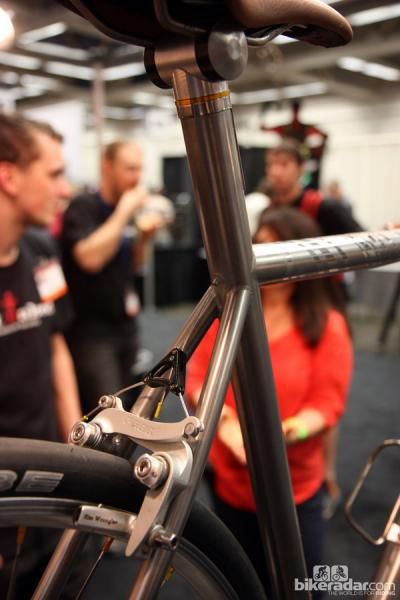 The rear brake cable is internally routed and exits right at the back of the seat tube on this Naked all-road bike.
