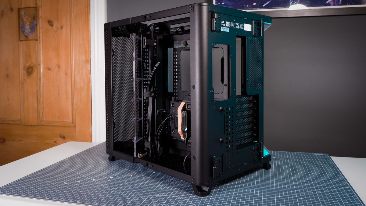 A Corsair Air 5400 PC case on a desk with various parts installed.