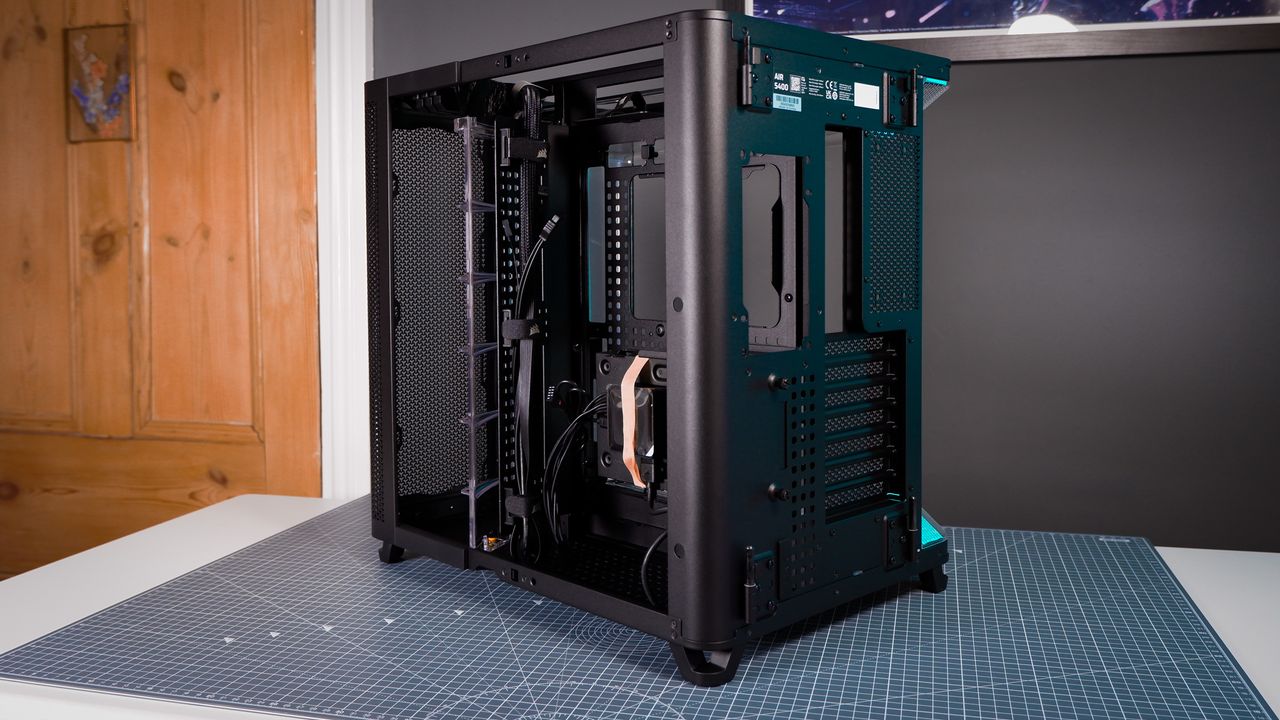 A Corsair Air 5400 PC case on a desk with various parts installed.