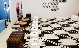 Kinder Modern created an interactive chessboard formed by geometric modular rugs and stools-cum-chess pieces designed by several contemporary designers, including Matthew Sullivan of AQQ Design