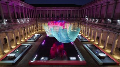 Kohler Co installation at Milan Design Week 2023 lit up at night